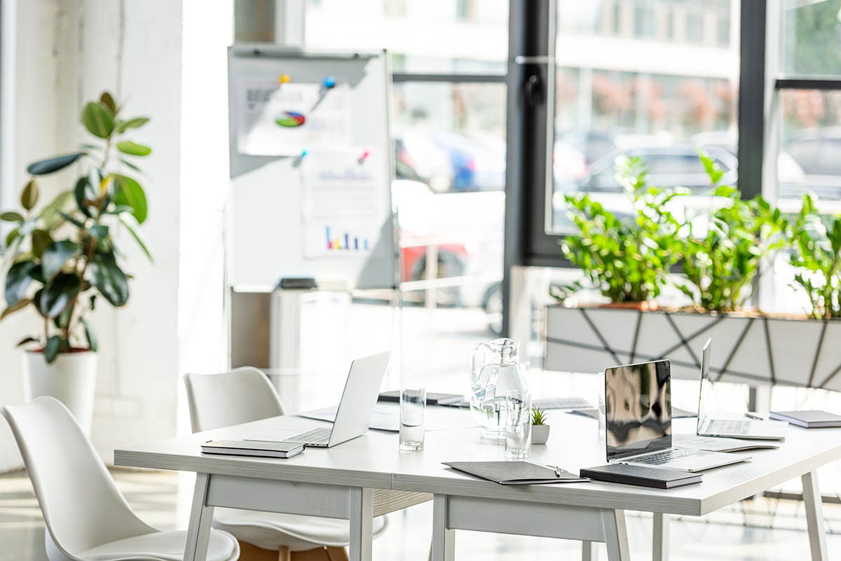 office-with-table-chairs-green-plants-and-digita-2023-11-27-05-17-32-utc-copy.jpg